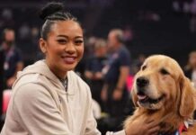 Beacon, un golden retriever de 4 años, es el primer perro de terapia oficial del equipo de Gimnasia de EUA .