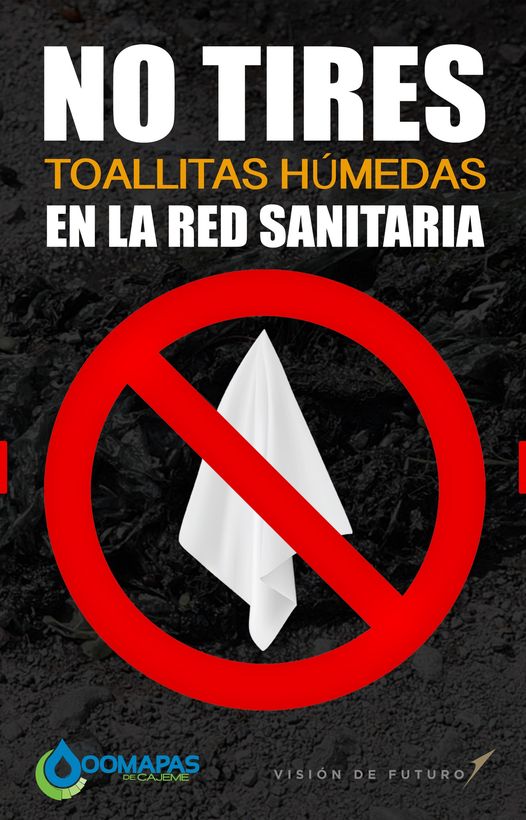 Close-up of woman using antibacterial wipe and cleaning hands in the bathroom.