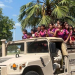 VISITAN NIÑOS DEL CAMPAMENTO DE VERANO DE BÁCUM, INSTALACIONES DEL 60 BATALLÓN DE INFANTERÍA